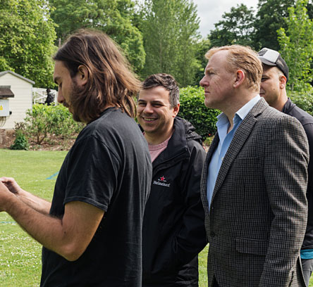Members of the BWH Drinks team talking outside